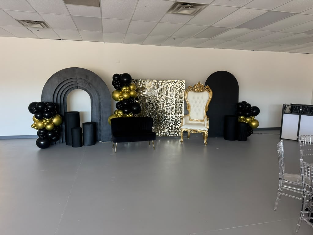 Social Experience Cincy event space with black and gold celebration decor